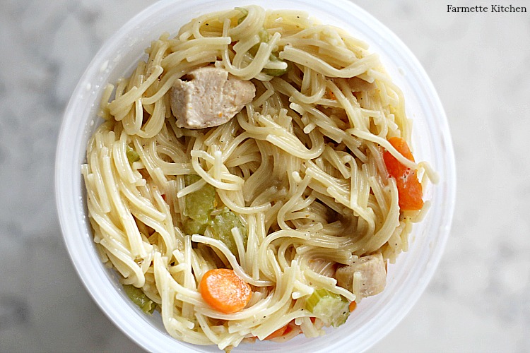 Instant Pot Chicken Noodle Soup in a plastic to-go container