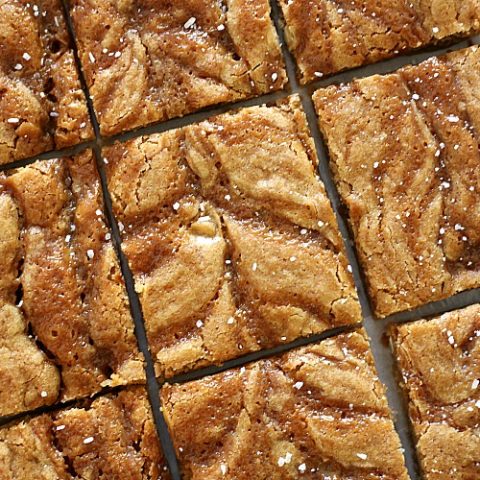 close up of salted caramel blondies cut into uniform squares