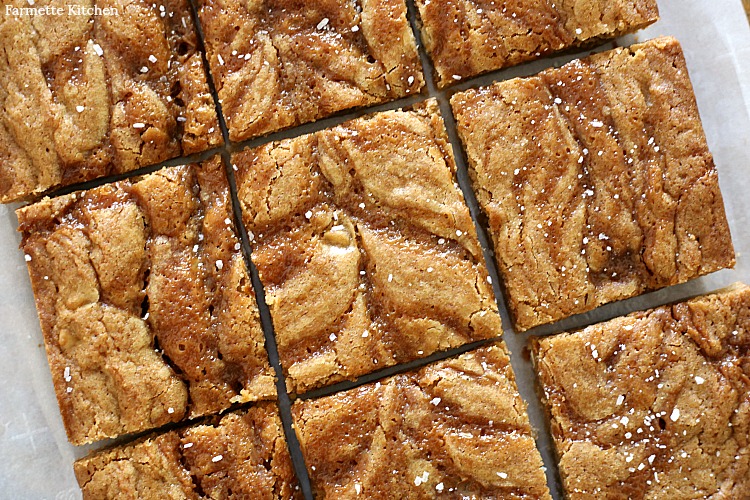 close up of salted caramel blondies cut into uniform squares