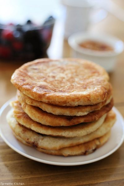 a stack of hotteok Korean pancakes on a plate
