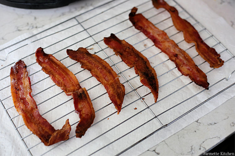 cooked bacon on a wire rack