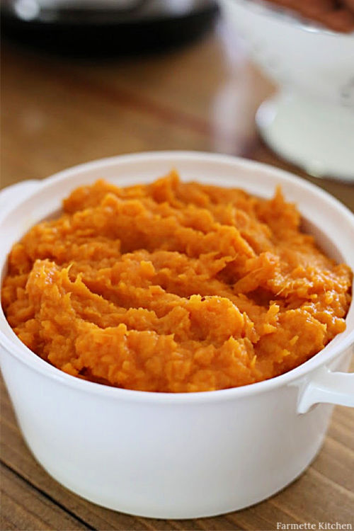 mashed sweet potatoes in a white dish