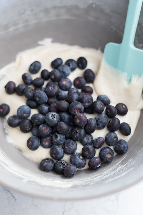 muffin batter with blueberries on top