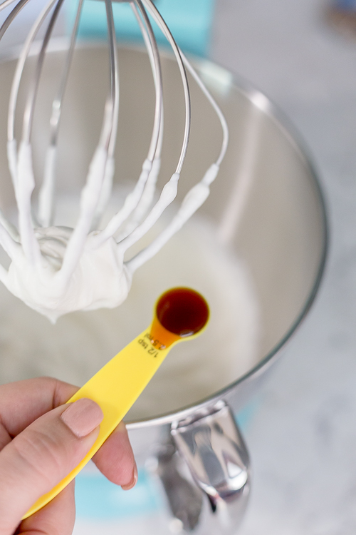 teaspoon of vanilla added to a mixing bowl