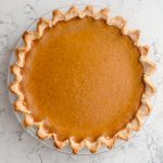pumpkin pie sitting on the counter