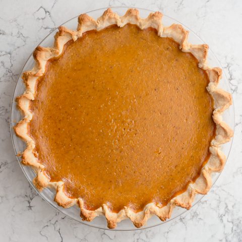 pumpkin pie sitting on the counter