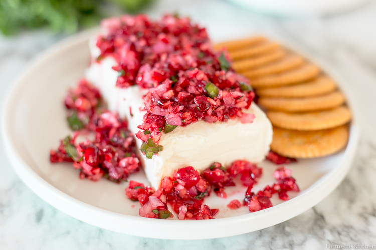 cranberry salsa on a plate with cream cheese