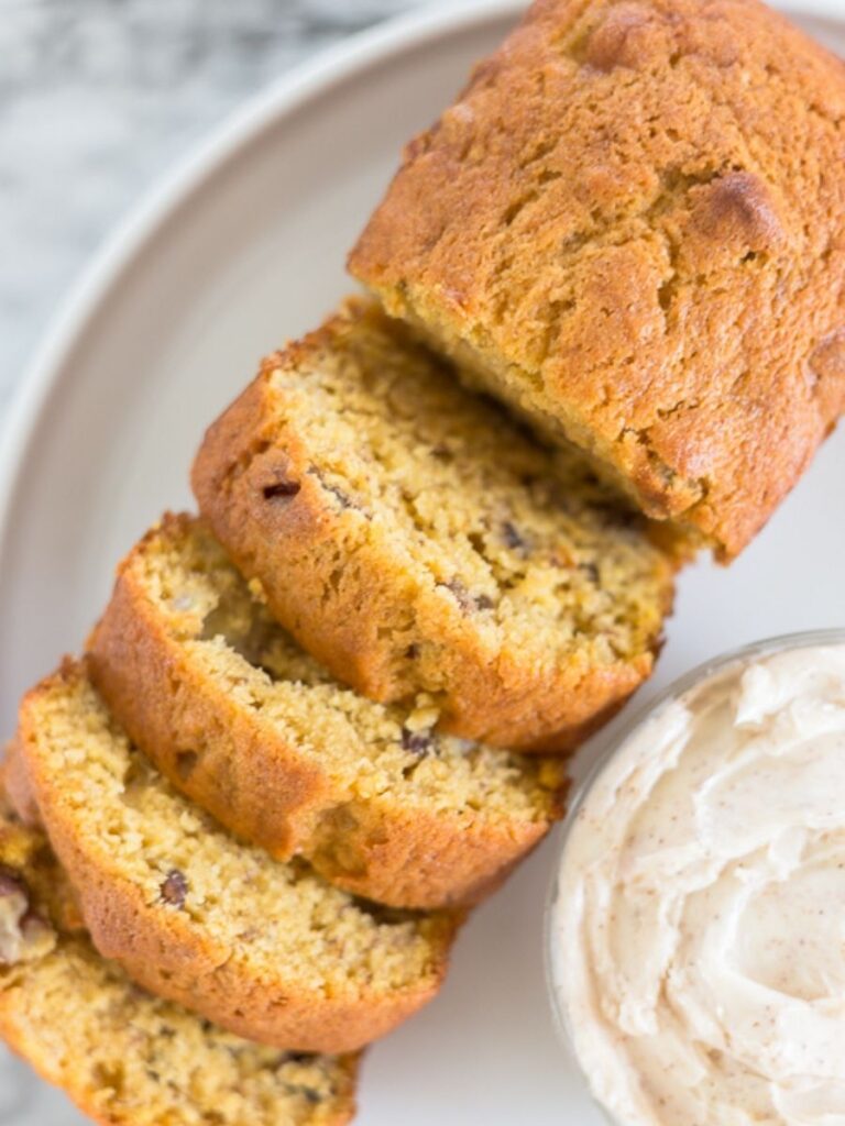 pumpkin banana bread sliced on a plate