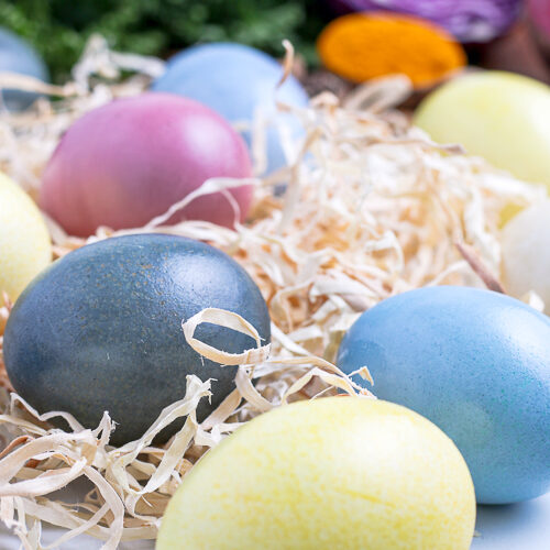 Natural Dyed Eggs on top of tan Easter grass