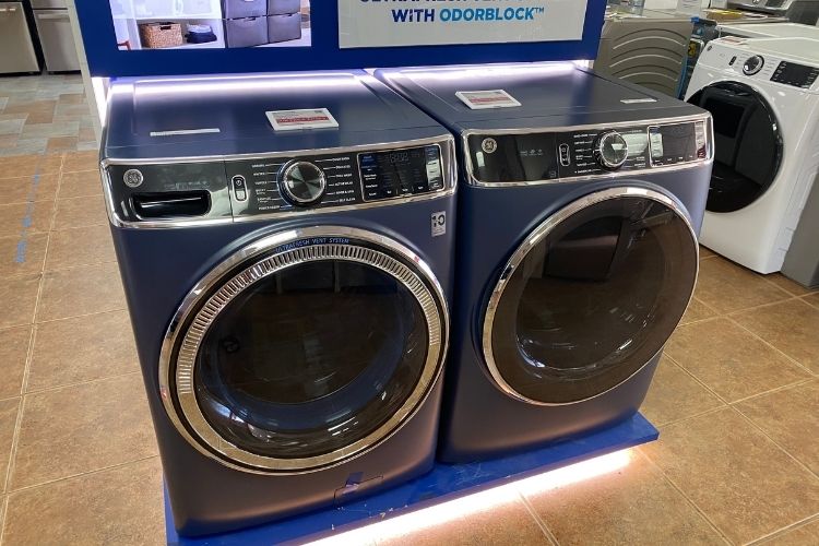 blue front load washer and dryer